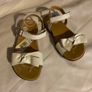 Selling NWT little girls sandals by stride rite, sensory response technology.